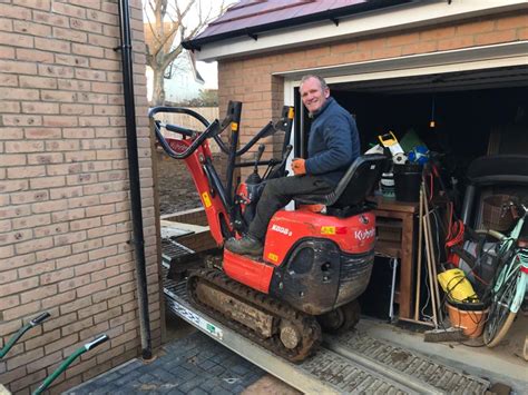 will a mini digger fit through a door|mini garden digger hire.